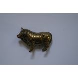 A novelty brass bull vesta case, 7cm long.