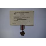 A World War I German Honour Cross of the World War, Das Ehrenkreuz des Weltkriegs, with original
