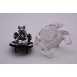 A Lalique 'Gregoire' toad, (a.f.); together with another chrome frog car mascot. (2)