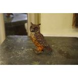 An early 20th century cold painted bronze eagle owl, in the manner of Franz Bergman, stamped '