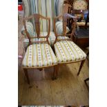 A pair of late Victorian rosewood and inlaid salon chairs.