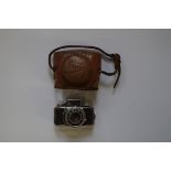 A vintage HIT (Made in Japan) sub miniature camera, in original leather case.