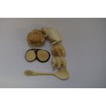 A small group of ivory and vegetable ivory items, to include a kangaroo, 5.5cm high, (chip to one