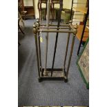 A Victorian brass six division stick stand, 61cm wide.