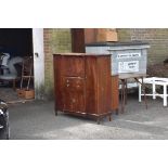 A mahogany side cabinet having folding writing slope to front.