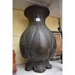 A large Chinese Archaistic bronze vase, relief mark to base, of moulded form with stylized
