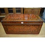 An old Eastern painted and stained wood trunk, with partially fitted interior, 70.5cm wide.