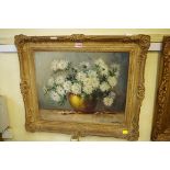 European School, still life of flowers in a vase, a pair, indistinctly signed, oil on canvas, 40 x