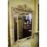 A large grey painted wall mirror, 128.5cm high x 85cm wide.