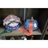 Two Chinese embroidered silk ceremonial hats, Qing, one with rock crystal finial and stitched script