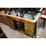 A late Victorian walnut pedestal desk, 122cm wide.