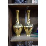 A pair of Japanese polished brass vases, applied with toads, 28.5cm high.