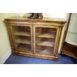 A Victorian figured walnut and inlaid credenza, 135cm wide.