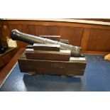 A reproduction cast iron cannon, on wooden carriage, barrel length 48cm, (non-fireable, for