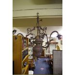 An old brass three branch ceiling light, 59cm high.