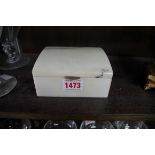A marble casket, bearing gilt brass plaque inscribed 'Made from marble taken from the walls of the