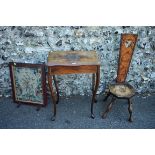 A Victorian walnut work table having hinged rising lid enclosing compartments 54cm wide; together