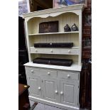 A modern white painted dresser and rack, 126cm wide.