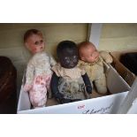 Three vintage baby dolls, to include a soft bodied black example, stamped to head, possibly by