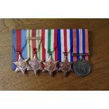 Medals: a World War II group of five to Edward John Hymas; together with later typed May/June 1944