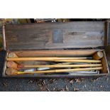 A croquet set in wooden case by Slazenger. This lot can only be collected on Saturday 5th