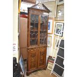 A good late Victorian mahogany and marquetry standing corner cupboard, in the manner of Edwards &