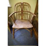 A good 19th century yew and elm Windsor chair, with crinoline stretcher.