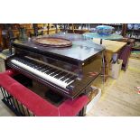 An antique dark stained Cramer baby grand piano, No.61053, length including keyboard 142cm.