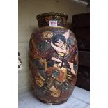 A large Japanese Satsuma pottery vase, relief decorated, 38cm high.