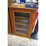 An old mahogany bookcase, with glazed door, 76.5cm wide.