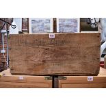 An old pine crate, indistinctly inscribed, 56cm wide.