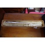 A mother-of-pearl and lace fan, the guards 35cm long, in card box labelled 'J Duvelleroy'.