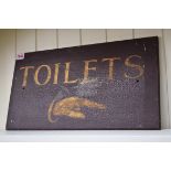 An old painted wood 'Toilets' sign, 25.5 x 40.5cm.