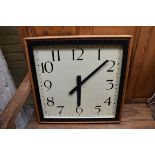 A large vintage wall timepiece, 53cm square, (with associated battery operated movement).