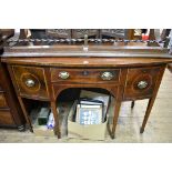 A George III mahogany, line inlaid and crossbanded bowfront sideboard, on square tapering legs,