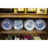 Four 18th century Chinese blue and white plates, largest 23cm diameter.