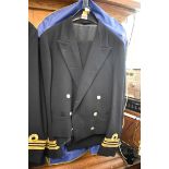 A Royal Naval Lt Commander's jacket and trousers.