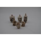 Three Chinese bone snuff bottles and stoppers, largest 8.5cm high; together with three other small