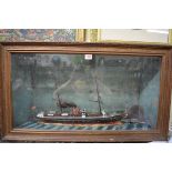 An antique carved and painted wood ship's diorama, 47 x 82cm.