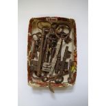 A collection of antique steel keys.