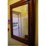 A contemporary hardwood framed rectangular wall mirror, 121 x 91cm.