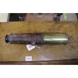 A circa 1918 leather and brass three drawer telescope, inscribed 'TT & H Ltd, No.35597...', 92.5cm