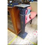 An ebonized Corinthian column pedestal, 114cm high.