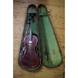 An antique violin, labelled 'The Maidstone', with 13¼in back, in ebonized case, with two bows;