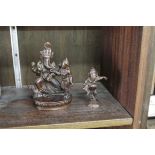 An Indian bronze figure group of Ganesh, 14cm high; together with another similar smaller example.