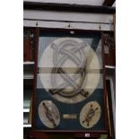 A reproduction framed rope knot display, the whole 91 x 60cm.