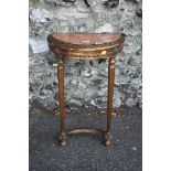 A small 18th century giltwood console table, having rouge marble inset top, 43cm wide, (marble