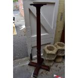 A mahogany 'bed post' torchere, 142cm high.