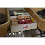 Dinky Toys: two vintage diecast vehicles comprising: Packard Clipper No.180 (cerise/beige); and Nash