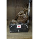 A bronze figure of a semi-nude, on marble base, total height 25cm.